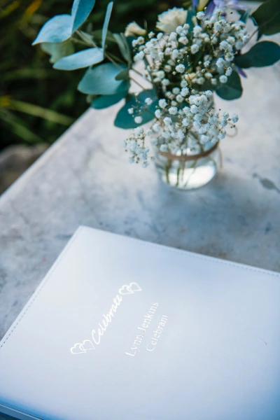 Celebrant's book and flowers
