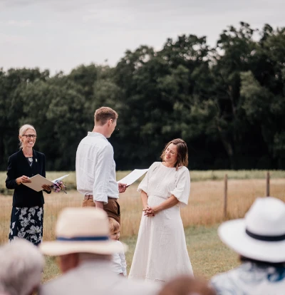 Couple getting married in the open