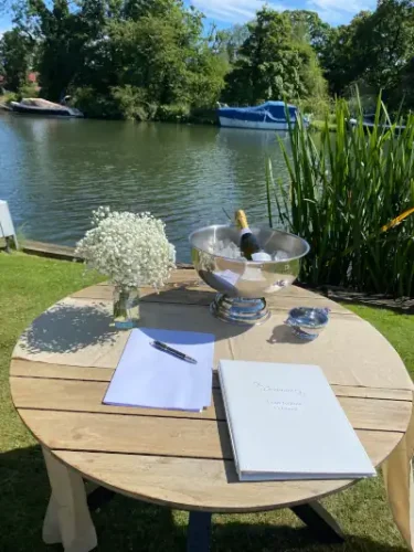 Wedding book on table with champagne